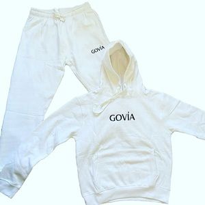 All white Govía sweatsuit